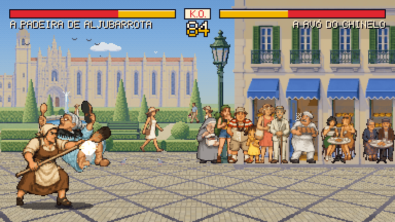 A Padeira de Aljubarrota lands a special move on a sunny square while the crowd watches